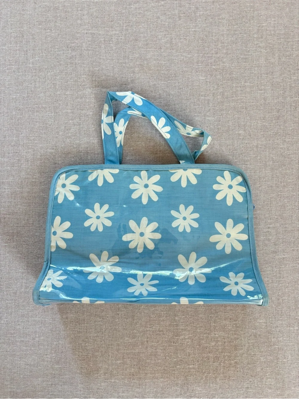 Vintage blue daisy boho vinyl clutch pouch.